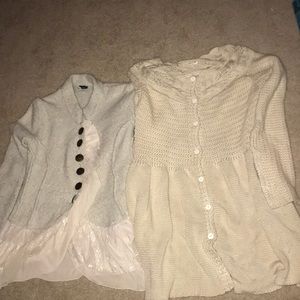 Two pairs of women’s sweaters